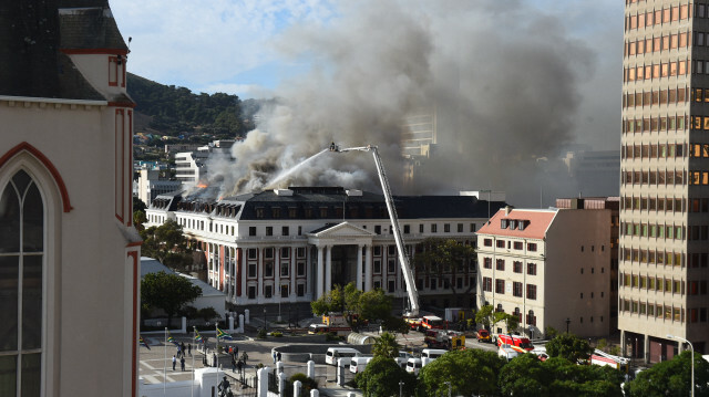 Smoke rises after the second fire in two days broke out at South Africa's National Assembly building in Cape Town, South Africa on January 3, 2022.