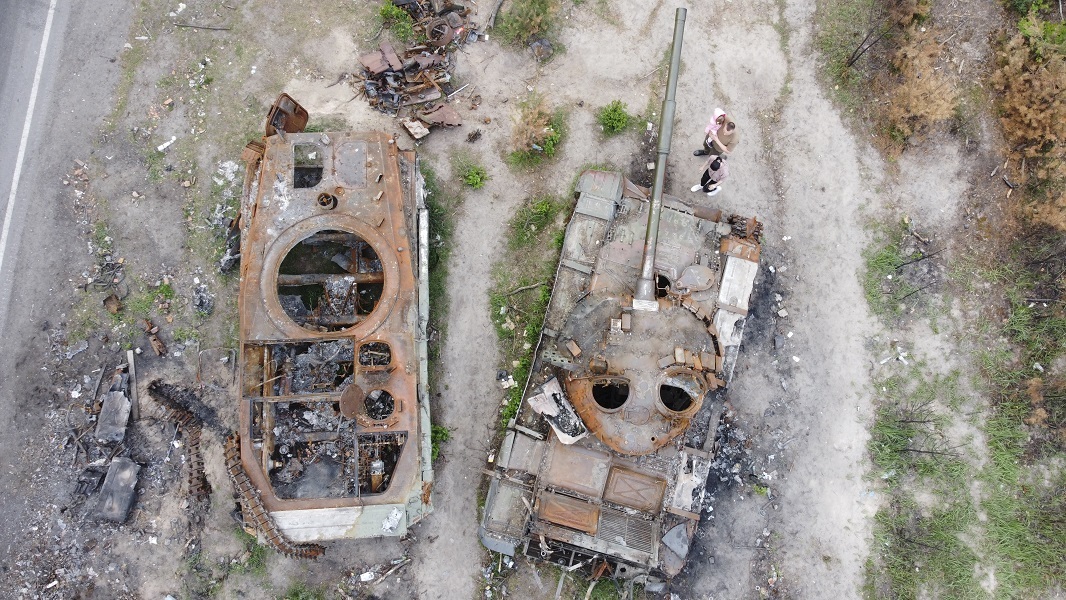Ukrainians show interest in destroyed military vehicles outside Kyiv
