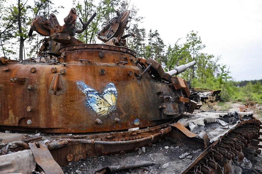 Ukrainians show interest in destroyed military vehicles outside Kyiv