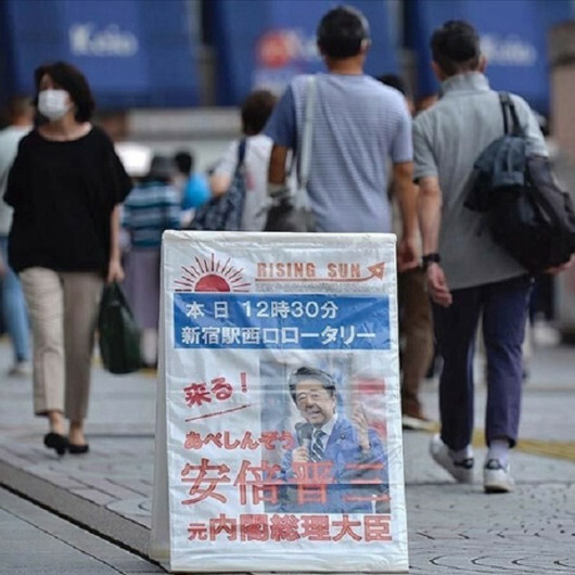 Voters in Japan go to polls in shadow of former premier’s assassination