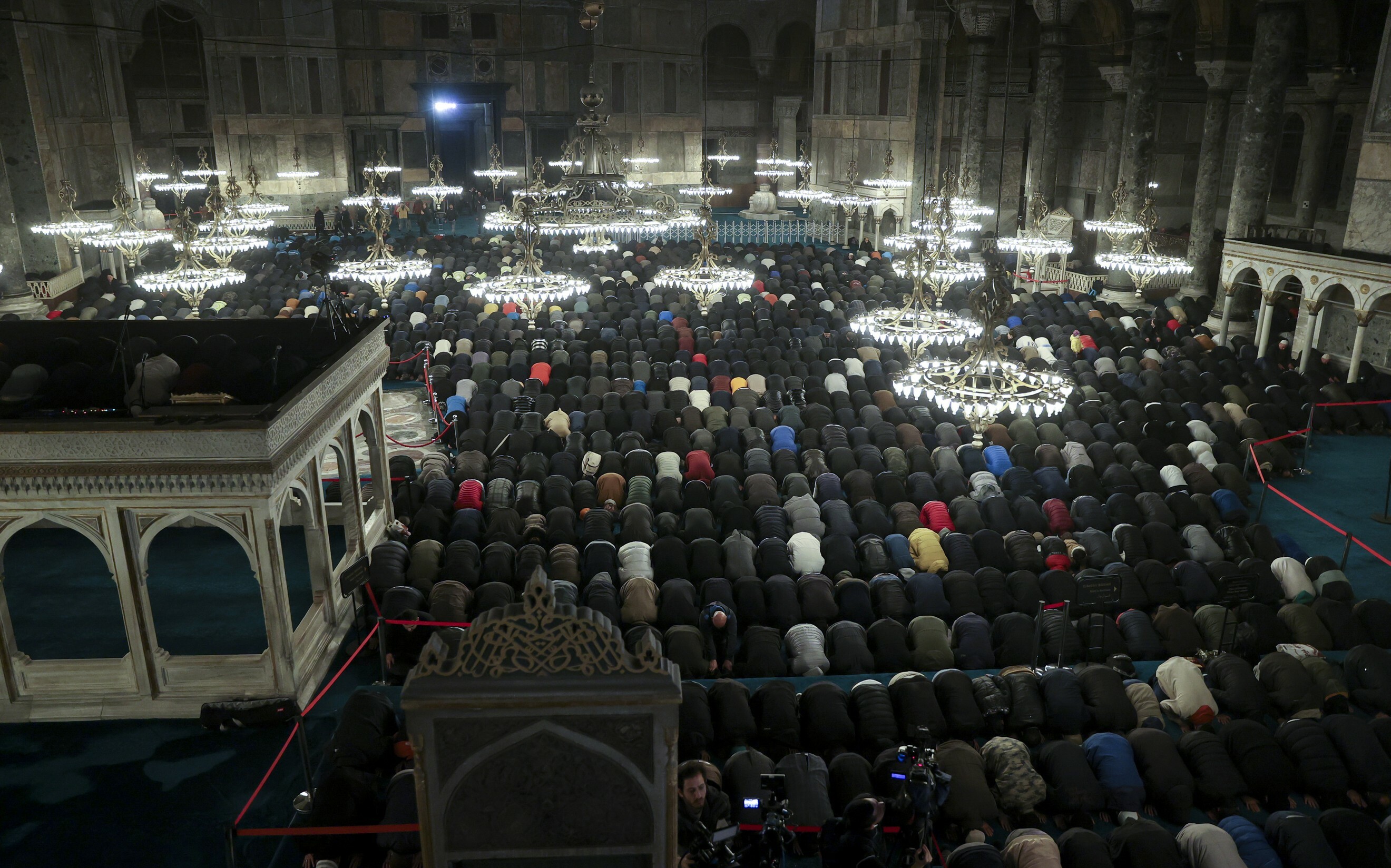 Muslims gather for morning prayer in Hagia Sophia Grand Mosque