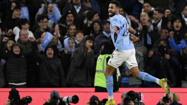 L'Algérien Riyad Mahrez célèbre son doublé contre Tottenham@Oli SCARFF / AFP