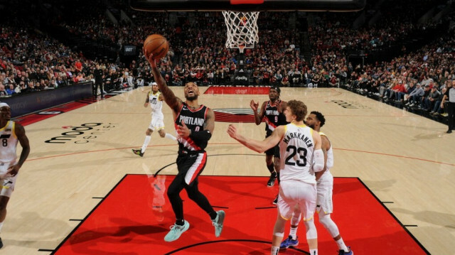 Lillard, un des 6 joueurs au monde à avoir inscrit 60 points en un match de NBA @Cameron Browne / NBAE / Getty Images / Getty Images via AFP