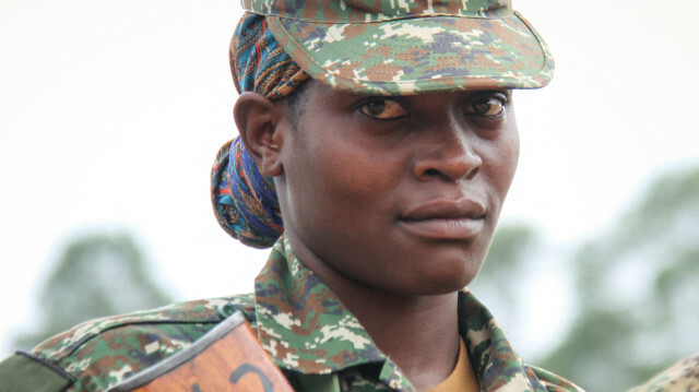 Une femme soldat des Forces de défense du peuple ougandais (UPDF) en mission de maintien de la paix pendant un an à leur base d'Arabisca, à 31 km de Mogadiscio, en Somalie. (2018)
@Gaël Grilhot / AFP

