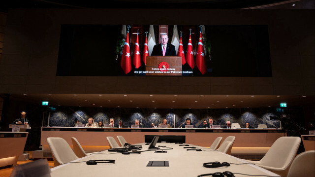 Le président turc Recep Tayyip Erdogan prononce un discours à distance lors d'une conférence sur la résilience du Pakistan au changement climatique, à Genève, le 9 janvier 2023. @ Fabrice COFFRINI / AFP