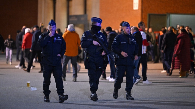 Patrouille policière à la sortie des supporters du stade Roi Baudouin suite à l'attaque armée ayant tué deux Suédois, à Bruxelles le 16 octobre 2023. Crédit photo: JOHN THYS / AFP
