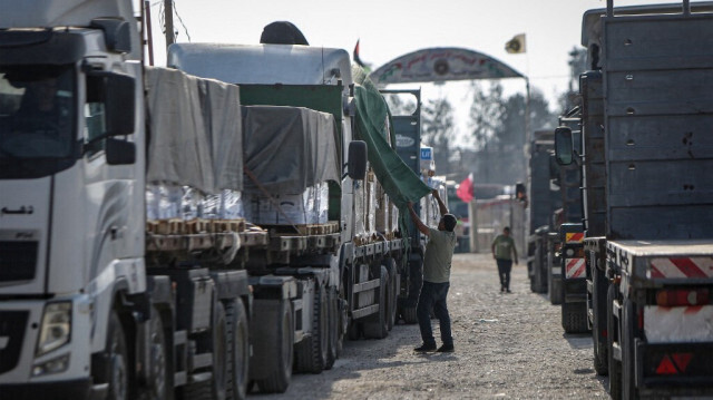 Un convoi de camions transportant de l'aide humanitaire entre dans la Bande de Gaza depuis l'Égypte via le poste frontière de Rafah, le 21 octobre 2023. Crédit photo: EYAD BABA / AFP / ARCHIVE