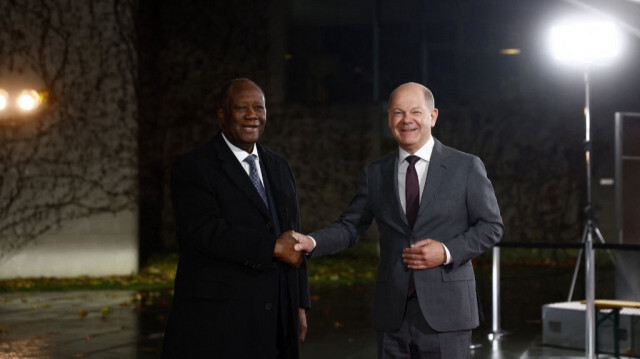 Le président de la République de Côte d'Ivoire Alassane Ouattara et le chancelier allemand Olaf Scholz. Crédit photo: MICHELE TANTUSSI / AFP