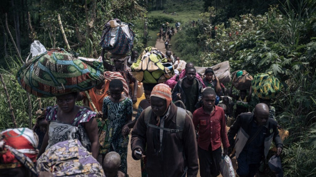 Réfugiés congolais fuyant l'avancée du M23, à 60 km au Nord de Goma. Crédit photo: ALEXIS HUGUET / AFP