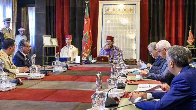 Le roi marocain Mohammed VI, accompagné du prince héritier Moulay El Hassan. Crédit photo: CARTE / AFP