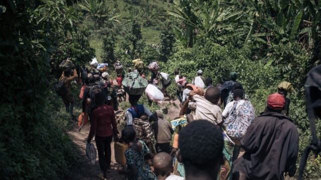 Les résidents de Bambo sur le territoire de Rutshuru, à 60 kilomètres au nord de Goma, en République Démocratique du Congo. 