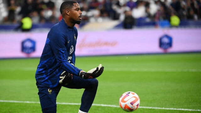 Mike Maignan, gardien de l'équipe de France. Crédit photo: FRANCK FIFE / AFP