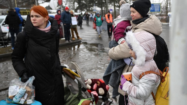 Famille de réfugiés ukrainiens. Crédit Photo: Daniel MIHAILESCU / AFP