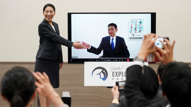 Ayu Yoneda chirurgien au Centre médical de la Croix-Rouge japonaise et Makoto Suwa  spécialiste de la prévention des catastrophes à la Banque mondiale. Crédit photo: Kazuhiro NOGI / AFP