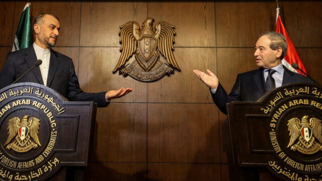 Le ministre iranien des Affaires étrangères, Hossein Amir-Abdollahian avec son homologue syrien, Fayçal al-Meqdad. Crédit photo: LOUAI BESHARA / AFP