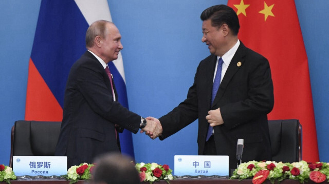 Les présidents russe (G) V. Poutine et chinois (D) Xi Jiniping. Crédit photo: WANG ZHAO / AFP