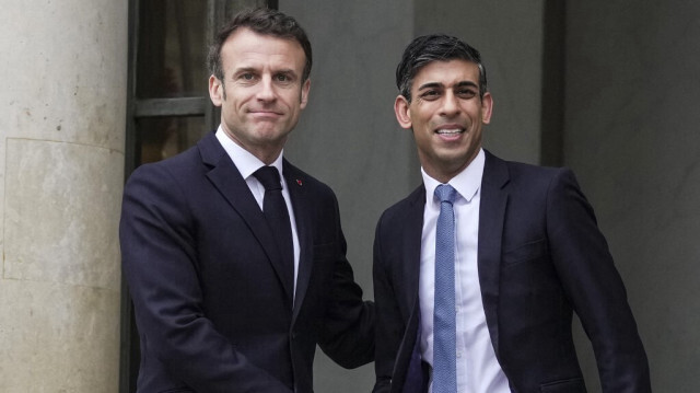 Le président français (G), E. Macron et le premier ministre britannique (D) R. Sunak. Crédit Photo: Kin Cheung / POOL / AFP
