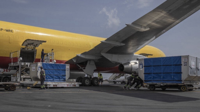 Le déchargement des aides humanitaire à partir d'un avion à l'aéroport international de Goma, en République démocratique du Congo.Crédit Photo: Guerchom Ndebo / AFP