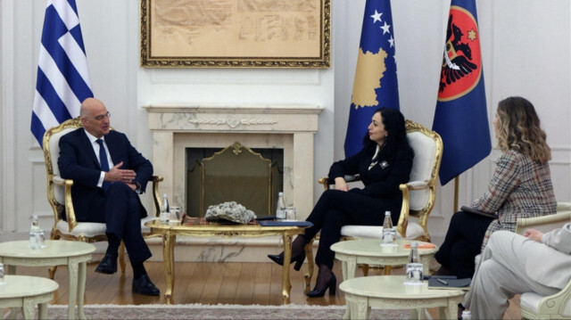 Greek foreign minister visits Kosovo ahead of its normalization talks with Serbia