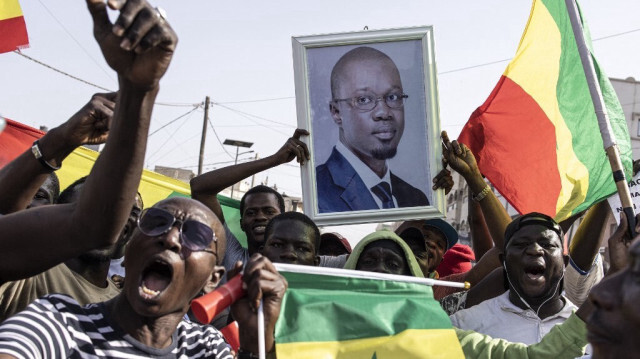 Les partisans de l'opposition avant le procès de l'un des dirigeants, Ousmane Sonko, à Dakar le 14 mars 2023. Crédit Photo: JOHN WESSELS / AFP
