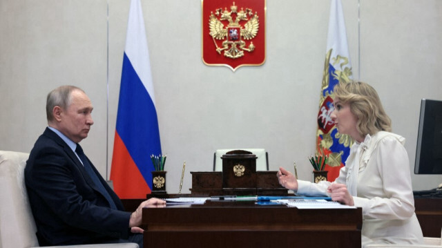 Le président russe et la commissaire aux droits de l'enfant Vladimir Poutine et Maria Alekseyevna Lvova-Belova. Crédit Photo:Mikhail METZEL / SPUTNIK / AFP