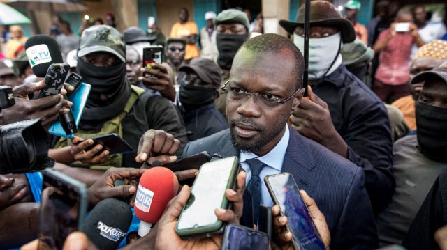 Ousmane Sonko(C), président du parti d'opposition Senegalese Patriots for Work, Ethics and Brotherhood (PASTEF).
Crédit Photo: MUHAMADOU BITTAYE / AFP