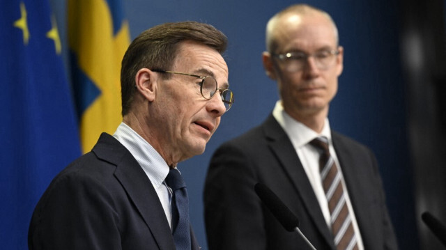 Le Premier ministre suédois Ulf Kristersson (G) et Oscar Stenström, ambassadeur dans la préparation du cabinet et négociateur en chef dans le processus de l'OTAN. Crédit Photo:
Fredrik SANDBERG / TT News Agency / AFP