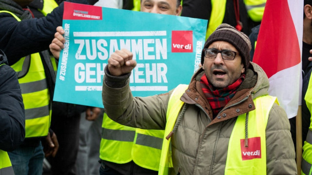 Des manifestants partisans de l'organisation syndicale Ver.di. Crédit Photo: ANDRE PAIN / AFP