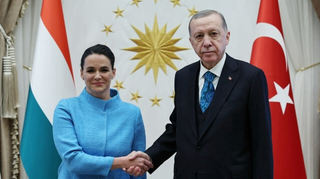 Turkish President Recep Tayyip Erdogan (R) and his Hungarian counterpart Katalin Novak (L)