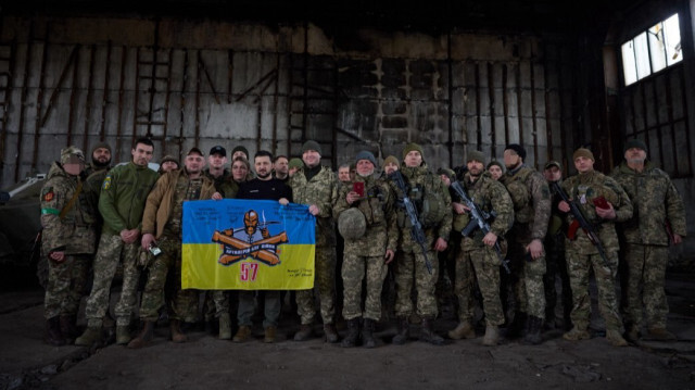 Ukrainian President Volodymyr Zelenskyy poses for a photo with Ukrainian soldiers during his visit to Bakhmut frontline amid Russia-Ukraine war in Donetsk region, Bakhmut, Ukraine on March 22, 2023.