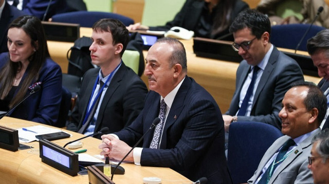Turkish Foreign Minister, Mevlut Cavusoglu (C) attends a special session on “International dialogue on migration” at the United Nations General Assembly in New York City, United States on March 30, 2023.