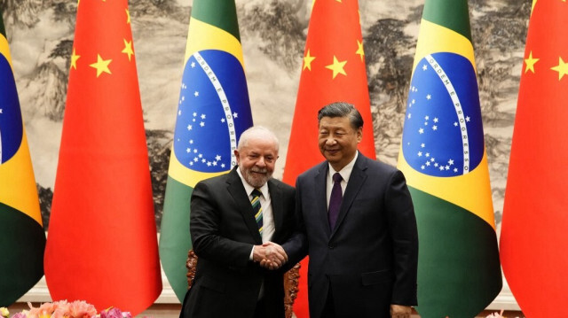 Le Président chinois, Xi Jinping et son homologue brésilien, Luiz Inacio Lula da Silva. Crédit photo: Ken Ishii / PISCINE / AFP