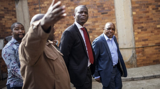 Le ministre sud-africain de la justice et des services correctionnels, Ronald Lamola (Au centre). Crédit photo: MICHELE SPATARI / AFP / ARCHIVE