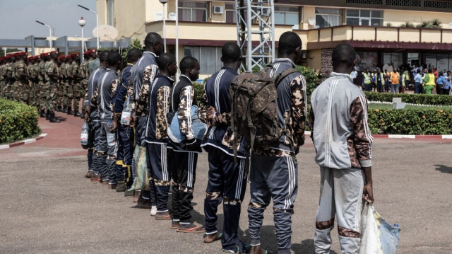 Soldats centrafricains libérés par des rebelles, Aéroport de Bangui, le 05/04/2023. Crédit photo: Barbara DEBOUT / AFP

