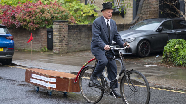 A 66-year-old man from London is among thousands of people who take part in countless protests in London, but what makes him different from others is his unique brand of activism -- conveying his message with a wheeled coffin.