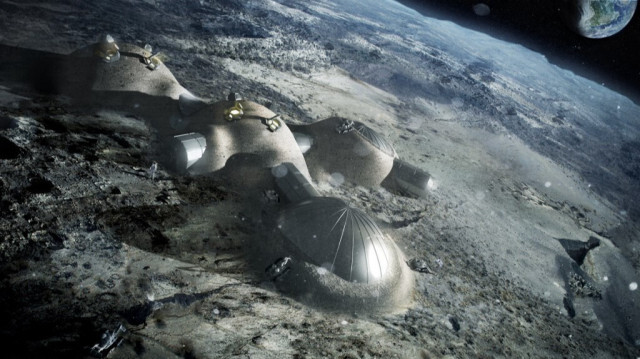 Une image de synthèse d'une base lunaire multi-dômes en cours de construction, basée sur le concept de l'impression 3D. Crédit photo: HO / AGENCE SPATIALE EUROPÉENNE / AFP