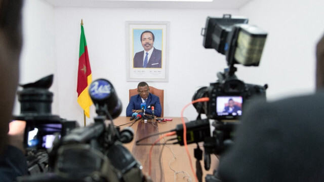 Le Premier ministre camerounais, Joseph Dion Ngute devant les médias. Crédit Photo: STRINGER / AFP