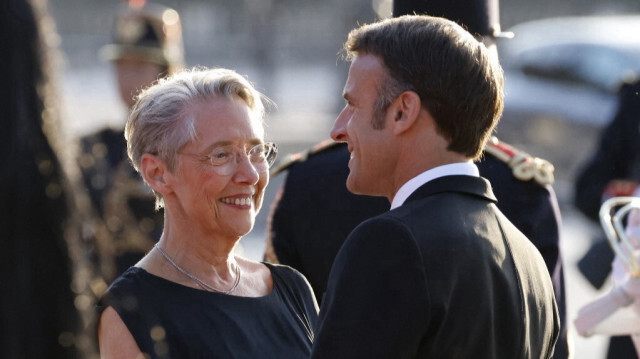 La Première ministre de la France, Élisabeth Borne et le Président de la République française, Emmanuel Macron. Crédit photo: LUDOVIC MARIN / AFP
