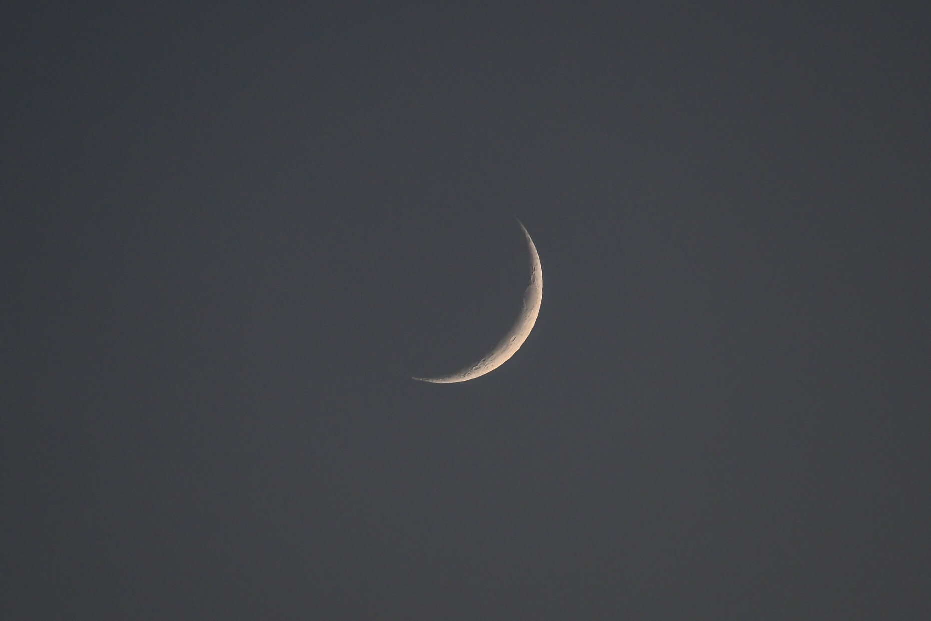 Crescent moon sets over the San Francisco Bay