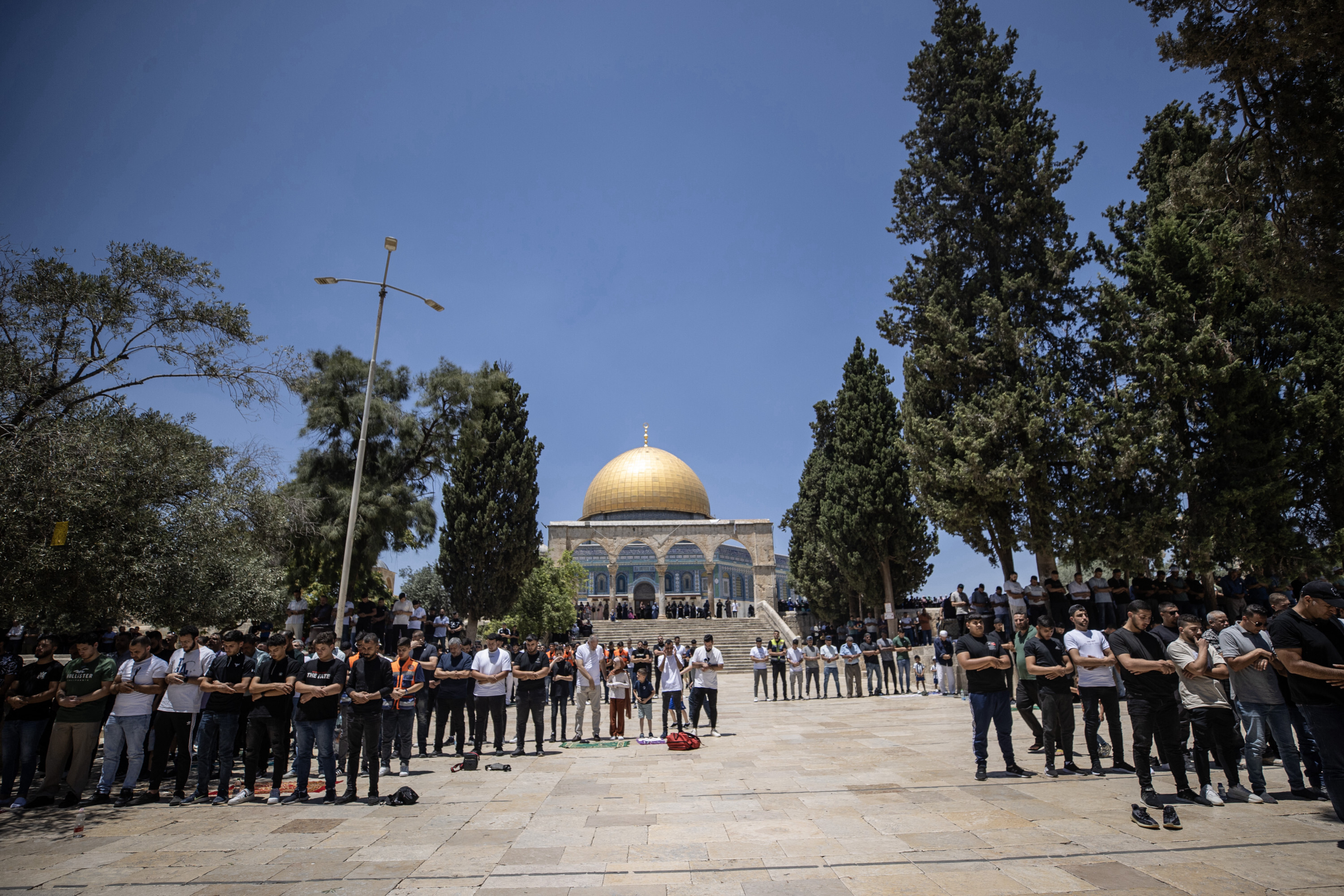 A poster exhibited in support of Jenin before Friday prayer at Aqsa Mosque