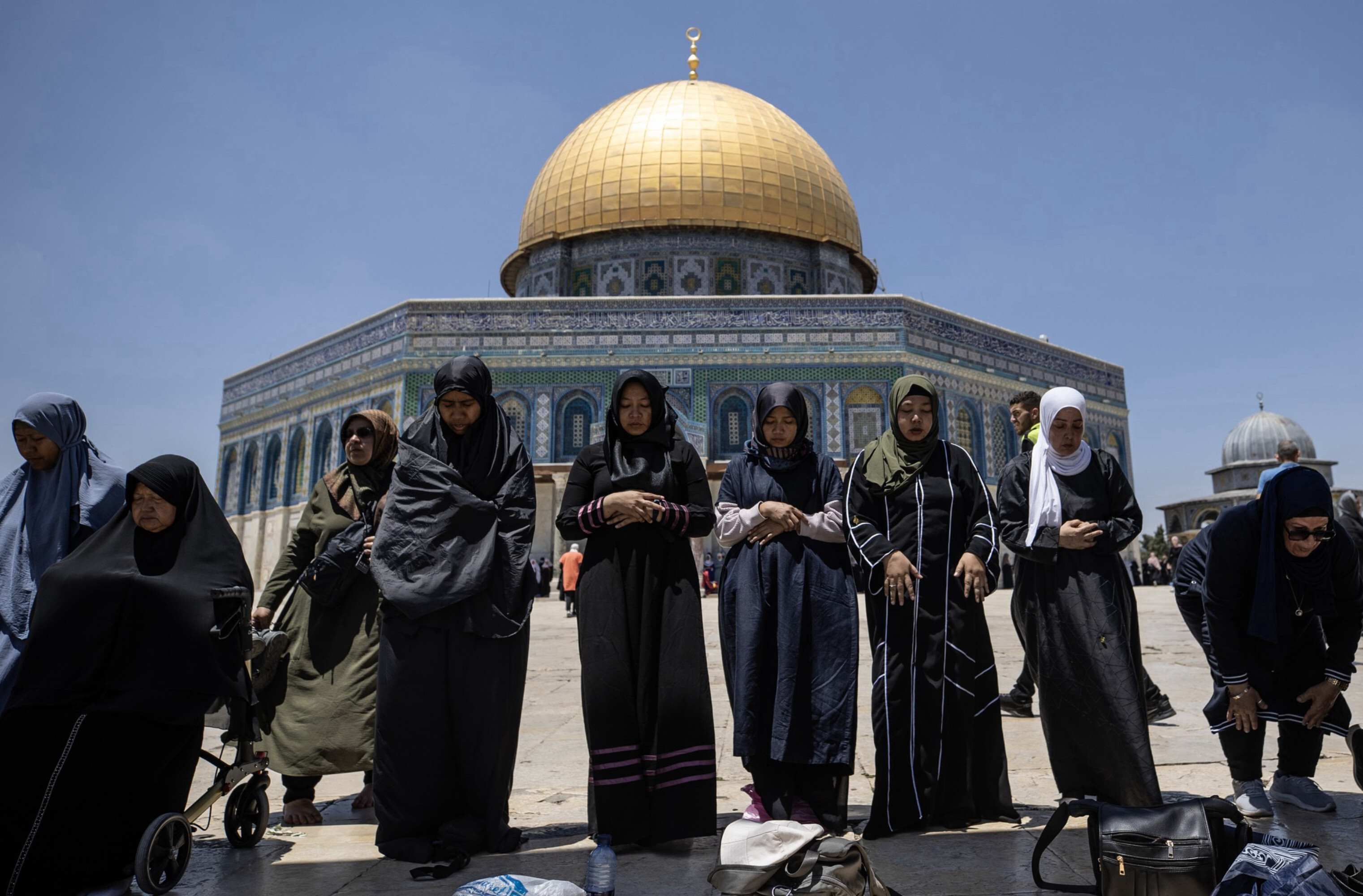 A poster exhibited in support of Jenin before Friday prayer at Aqsa Mosque