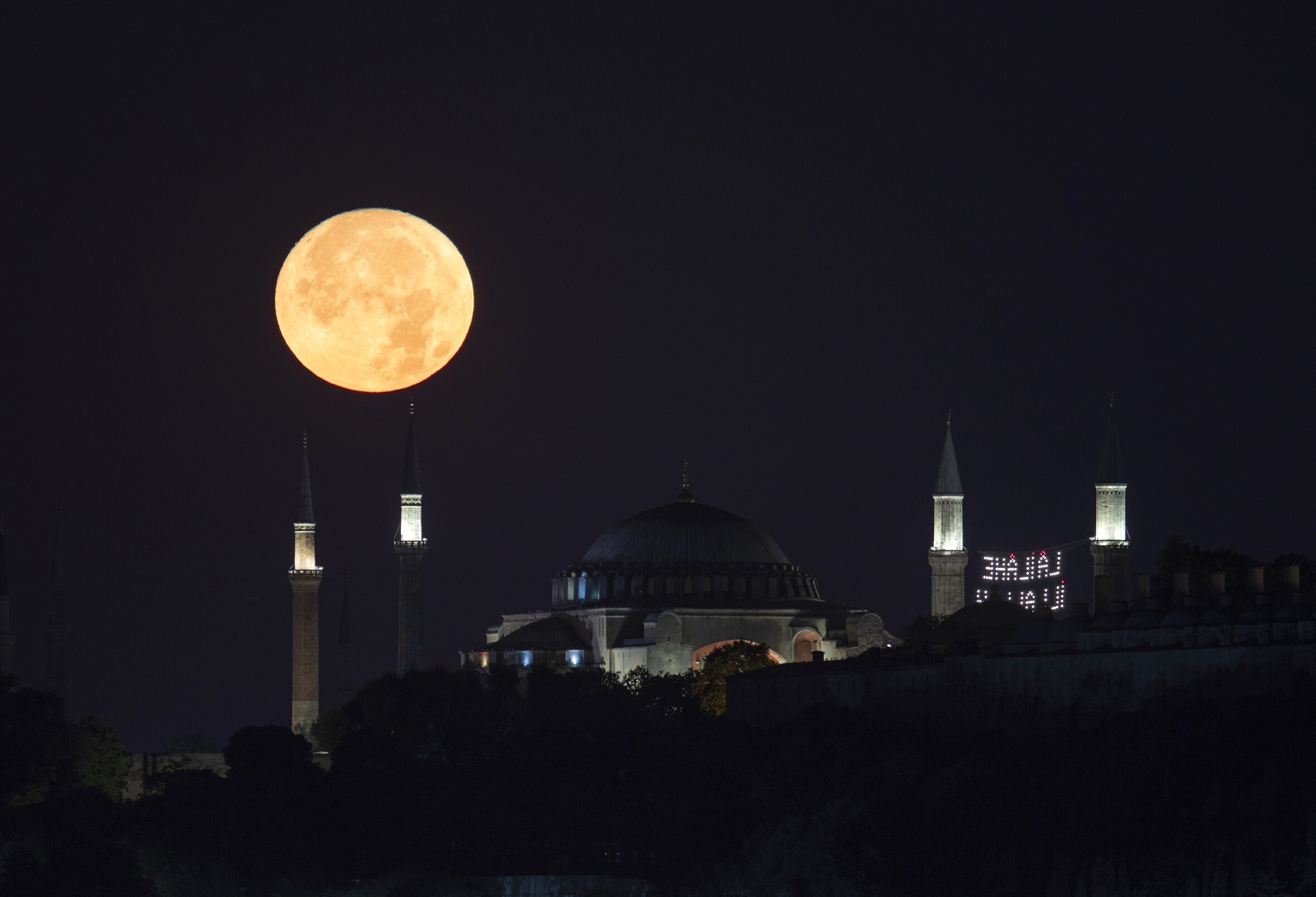 Super Moon rises over Istanbul landmarks
