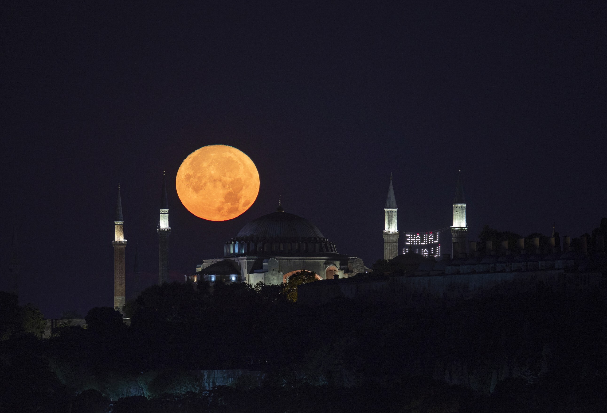 Super Moon rises over Istanbul landmarks