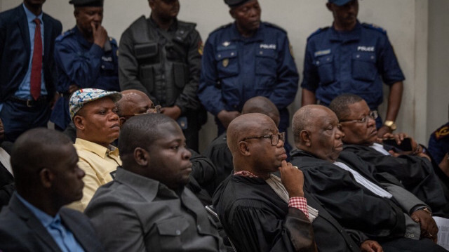 Les avocats de l'UDPS, représentant Felix Tshisekedi, et Jean-Marc Kabund, secrétaire général de l'UDPS (avec la casquette). Crédit photo: Caroline THIRION / AFP