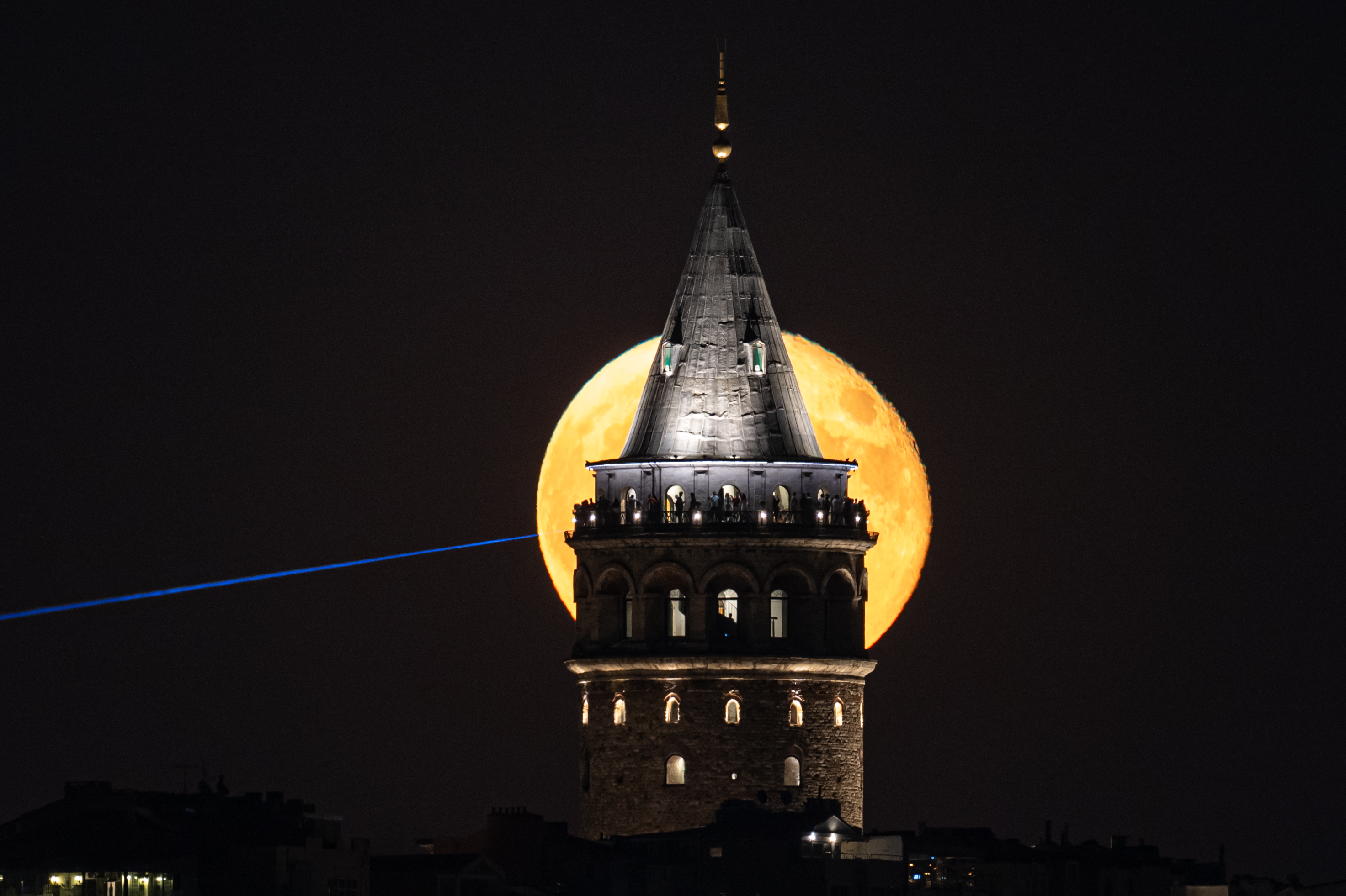 Full Moon rises over Galata Tower in Istanbul
