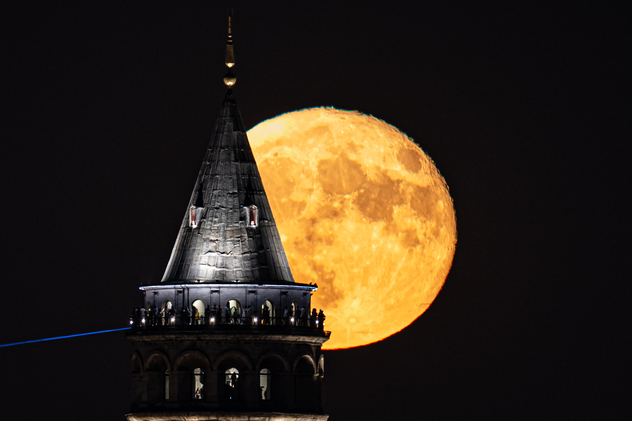 Full Moon rises over Galata Tower in Istanbul
