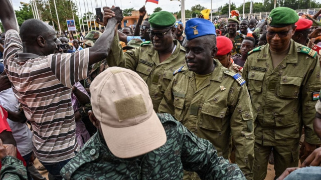 Le Conseil national du Niger pour la sauvegarde de la patrie (CNSP), le colonel-Major Amadou Abdramane, le général Mohamed Toumba et le colonel Ousmane Abarchi. Crédit photo: AFP