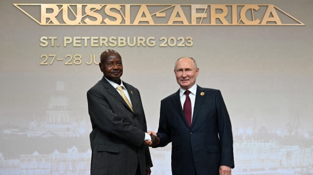 Le Président ougandais, Yoweri Museveni et son homologue russe, Vladimir Poutine. Crédit photo: Pavel BEDNYAKOV / POOL / AFP