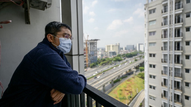 Asep Muizudin Muhamad Darmini, citoyen indonésien qui a récemment quitté l'hôpital après avoir été traité pour une maladie respiratoire causée par la pollution de l'air à Jakarta en Indonésie. Crédit photo: BAY ISMOYO / AFP 