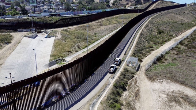 Photographie aérienne de la frontière entre les États-Unis et le Mexique, à San Ysidro, en Californie, prise le 14 septembre 2023. Crédit photo: SANDY HUFFAKER / AFP
